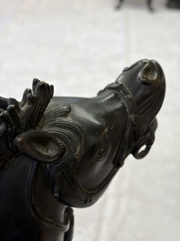 A large Chinese bronze horse-shaped incense burner and cover, 17/18th C.