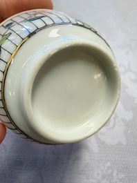 A Chinese famille rose cup and saucer with floral design, Yongzheng