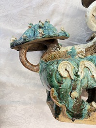 A pair of large Chinese polychrome-glazed Shiwan stoneware Buddhist lions, 19th C.