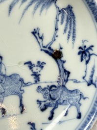 A pair of Chinese blue and white 'Ca Mau' shipwreck cups and saucers, Yongzheng