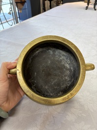 A fine Chinese bronze censer with loop handles and stand, Xuande mark, 18th C.