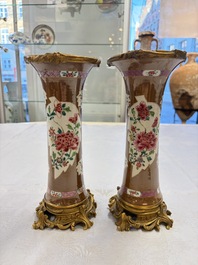 A pair of gilt-bronze-mounted Chinese famille rose capucine-ground vases and a covered bowl, Qianlong