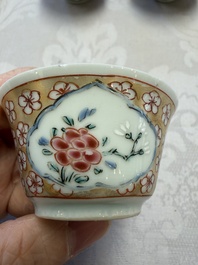 Six Chinese famille rose gilt-decorated 'Flower Basket' cups and saucers, Yongzheng/Qianlong