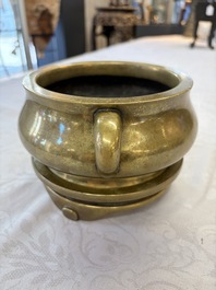A fine Chinese bronze censer with loop handles and stand, Xuande mark, 18th C.