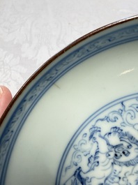 A Chinese blue and white pencil-style 'Buddhist Lions' plate, Chenghua mark, Shunzhi/Kangxi