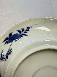 Eleven Chinese blue and white gadrooned 'Flowers and Peacocks' plates, Kangxi