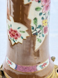 A pair of gilt-bronze-mounted Chinese famille rose capucine-ground vases and a covered bowl, Qianlong