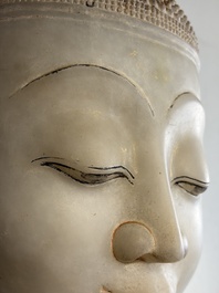 A monumental Burmese white marble Post-Pagan Buddha with traces of gilt-lacquer, Ava Kingdom, 17th C