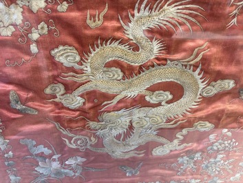 A Vietnamese mother-of-pearl-inlaid wooden 'Fishermen' table screen and an embroidered silk 'Dragon' panel, 19th C.