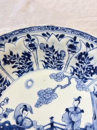 A pair of Chinese blue and white moulded dishes with dancing ladies, Kangxi