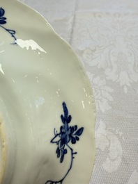 Eleven Chinese blue and white gadrooned 'Flowers and Peacocks' plates, Kangxi