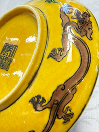 A small Chinese yellow-ground aubergine and green enamelled dragon plate, Qianlong mark, 19/20th C.