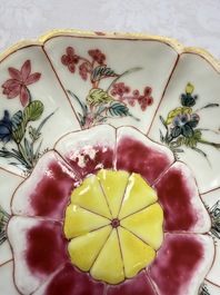 A rare Chinese famille rose moulded cup and saucer with floral design, Yongzheng