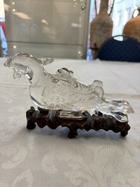 Three Chinese rock crystal sculptures on wooden stands, Republic