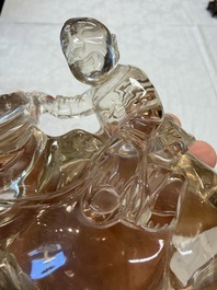 Three Chinese rock crystal sculptures on wooden stands, Republic