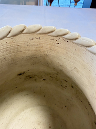 A Chinese Nanking white-glazed 'hu' vase with figural relief design, 19th C.