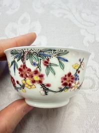 Three Chinese famille rose 'Birds and Plum Trees' cups and saucers, Yongzheng