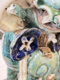 A pair of large Chinese polychrome-glazed Shiwan stoneware Buddhist lions, 19th C.