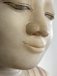 A monumental Burmese white marble Post-Pagan Buddha with traces of gilt-lacquer, Ava Kingdom, 17th C