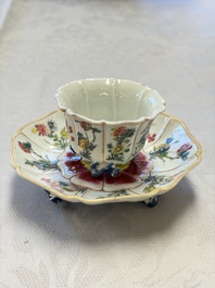 A rare Chinese famille rose moulded cup and saucer with floral design, Yongzheng