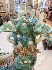 A pair of large Chinese polychrome-glazed Shiwan stoneware Buddhist lions, 19th C.