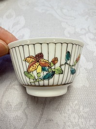 A Chinese famille rose cup and saucer with floral design, Yongzheng