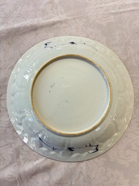 A pair of Chinese blue and white moulded dishes with dancing ladies, Kangxi