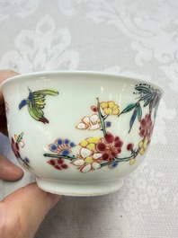 Three Chinese famille rose 'Birds and Plum Trees' cups and saucers, Yongzheng