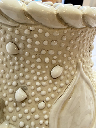 A Chinese Nanking white-glazed 'hu' vase with figural relief design, 19th C.