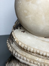 A monumental Burmese white marble Post-Pagan Buddha with traces of gilt-lacquer, Ava Kingdom, 17th C