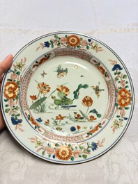 Three Chinese famille verte plates with floral design, one powder-blue-ground, Kangxi