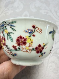 Three Chinese famille rose 'Birds and Plum Trees' cups and saucers, Yongzheng