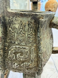 A Chinese archaic bronze wine vessel with owl design, Jia 斝, late Shang