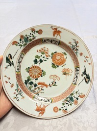 Three Chinese famille verte plates with floral design, one powder-blue-ground, Kangxi