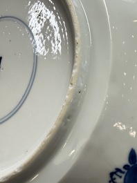 Eleven Chinese blue and white gadrooned 'Flowers and Peacocks' plates, Kangxi