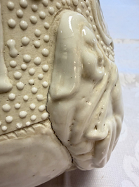 A Chinese Nanking white-glazed 'hu' vase with figural relief design, 19th C.