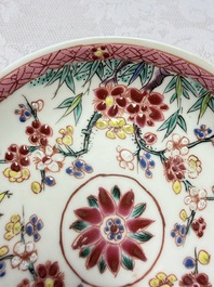 Three Chinese famille rose 'Birds and Plum Trees' cups and saucers, Yongzheng