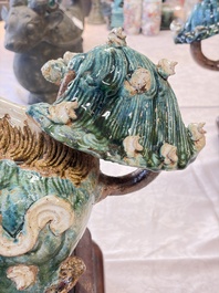A pair of large Chinese polychrome-glazed Shiwan stoneware Buddhist lions, 19th C.