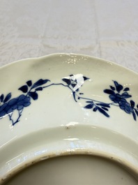 Eleven Chinese blue and white gadrooned 'Flowers and Peacocks' plates, Kangxi
