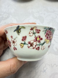 Three Chinese famille rose 'Birds and Plum Trees' cups and saucers, Yongzheng