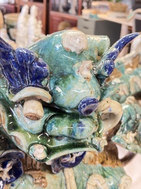 A pair of large Chinese polychrome-glazed Shiwan stoneware Buddhist lions, 19th C.