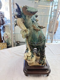 A pair of large Chinese polychrome-glazed Shiwan stoneware Buddhist lions, 19th C.