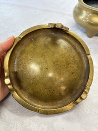 A fine Chinese bronze tripod censer and stand, Xuande mark, 17/18th C.
