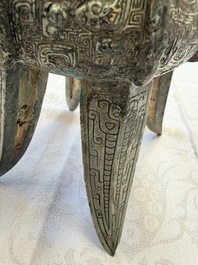 A Chinese archaic bronze wine vessel with owl design, Jia 斝, late Shang