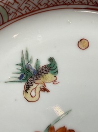 Three Chinese famille verte plates with floral design, one powder-blue-ground, Kangxi