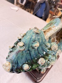 A pair of large Chinese polychrome-glazed Shiwan stoneware Buddhist lions, 19th C.