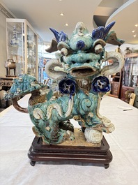 A pair of large Chinese polychrome-glazed Shiwan stoneware Buddhist lions, 19th C.