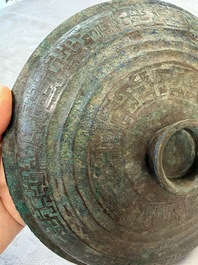 A Chinese archaic bronze serving vessel and cover, Eastern Zhou/Spring and Autumn