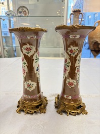 A pair of gilt-bronze-mounted Chinese famille rose capucine-ground vases and a covered bowl, Qianlong