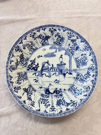A pair of Chinese blue and white moulded dishes with dancing ladies, Kangxi